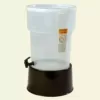 Carlisle 5 gal. Polypropylene Round Beverage Dispenser with Base in Translucent Reservoir and Black Base