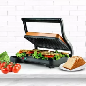 Ovente Copper Electric Panini Press Grill, 2-Slice 1000-Watt Heating Plate, Drip Tray Included