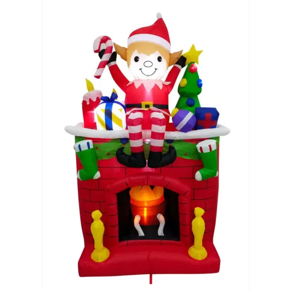 Fraser Hill Farm 6.5 ft. Pre-Lit Elf Sitting on a Fireplace Christmas Inflatable