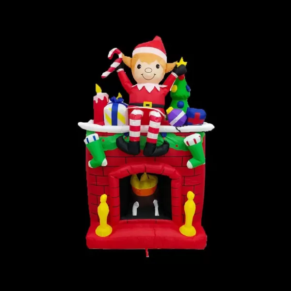 Fraser Hill Farm 6.5 ft. Pre-Lit Elf Sitting on a Fireplace Christmas Inflatable