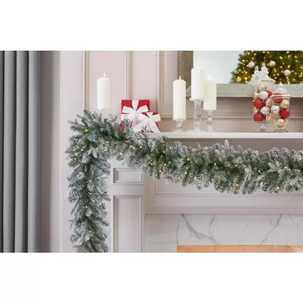 Home Accents Holiday 9 ft Starry Light Battery Operated Flocked Frasier Fir LED Pre-Lit Garland with Timer