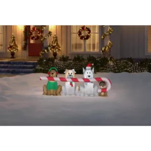 Home Accents Holiday 8 ft. W Pre-Lit Giant Airblown Inflatable Christmas Puppies with Candy Cane Scene